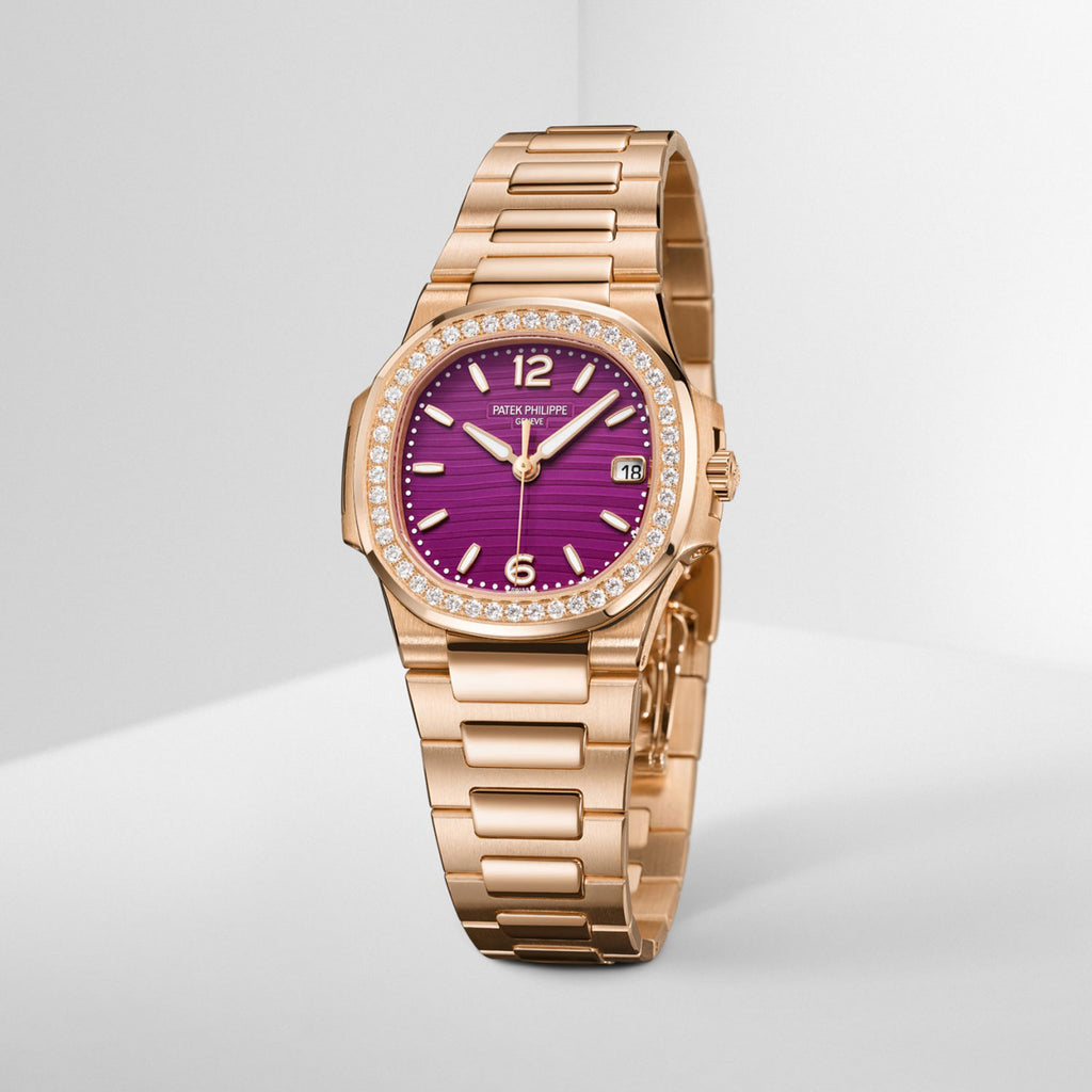 Gold watch with a purple face on a light gray background