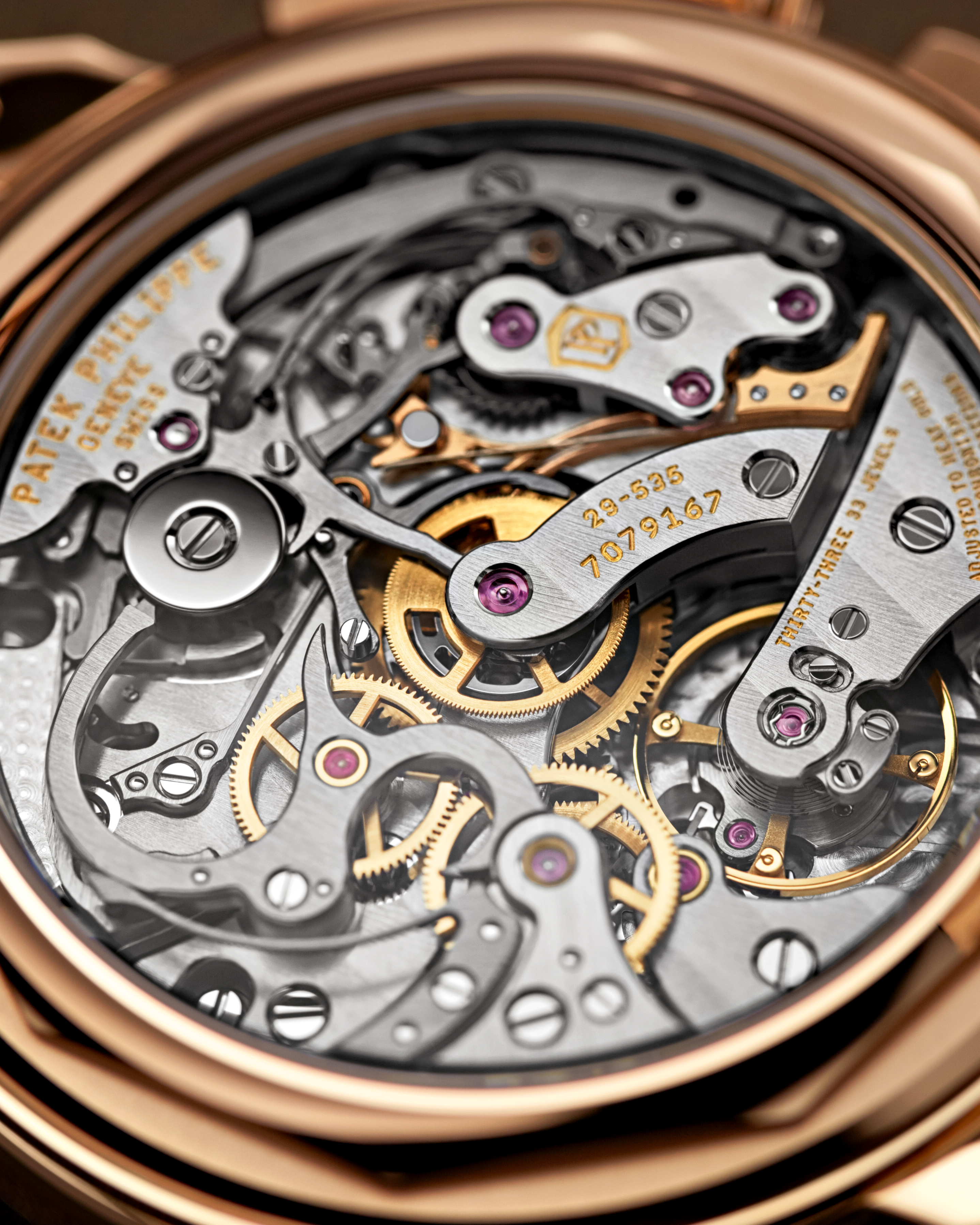Close-up of a Patek Philippe watch mechanism with intricate details.
